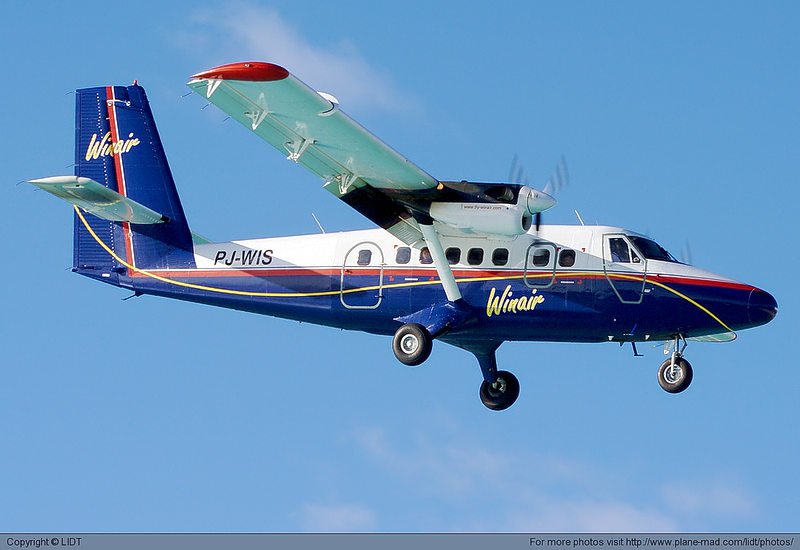 A Winair Twin Otter in route to the shortest commercial airport on earth.